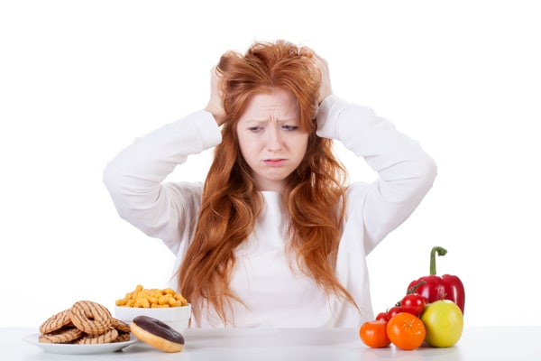 woman deciding what to eat