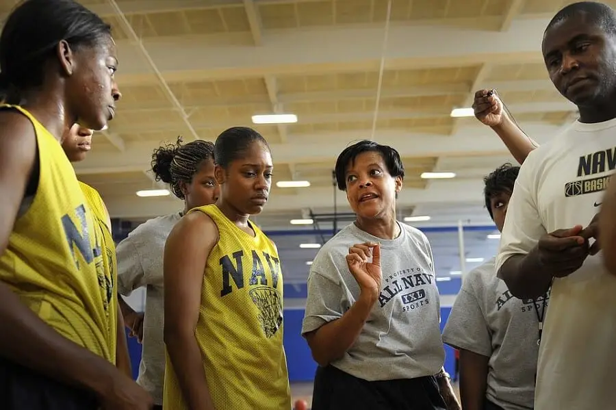 coach talking to the team looking angry