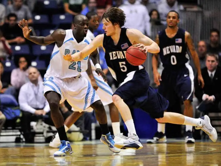 basketball player trying to shoot the ball